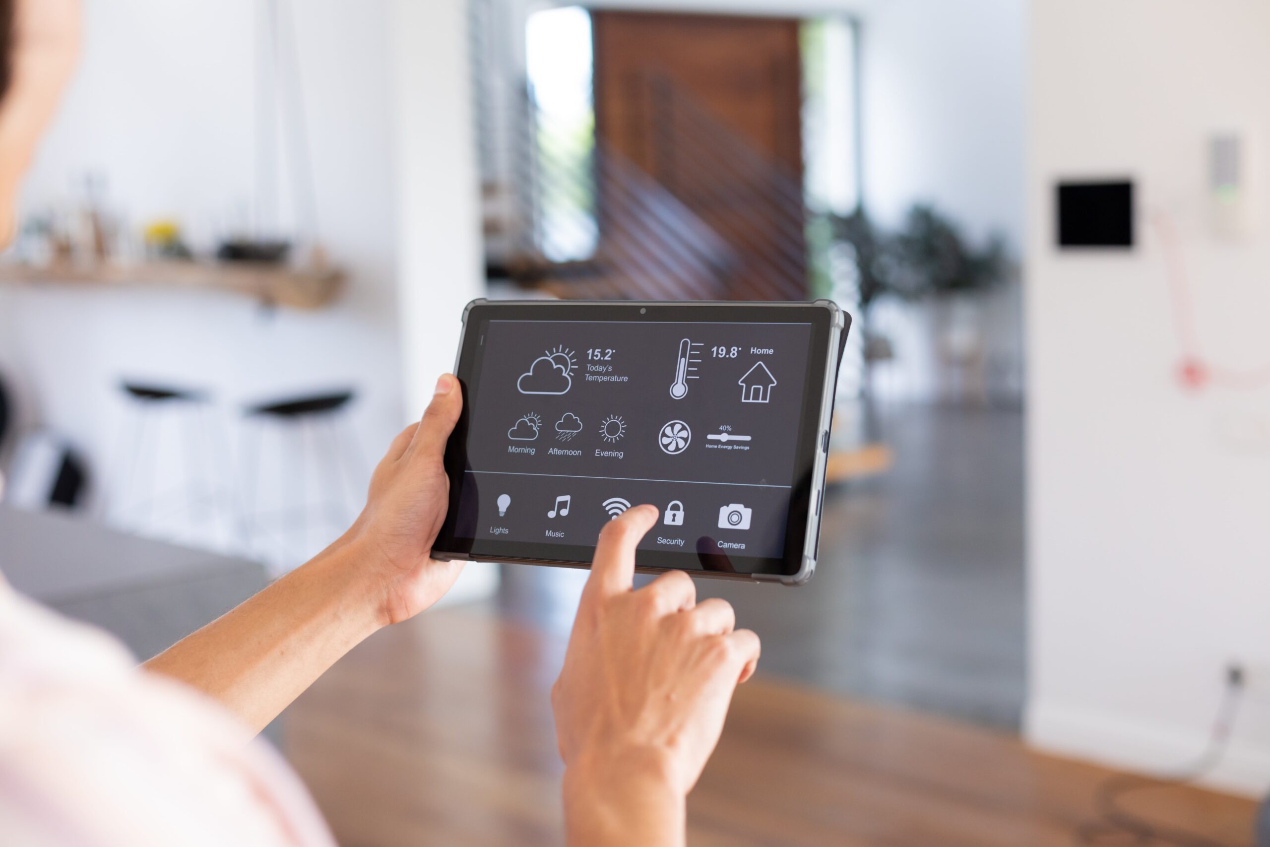 hands-of-biracial-man-at-home-using-tablet